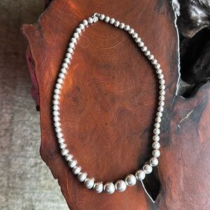 Blue Nile 18” sterling silver graduated necklace.